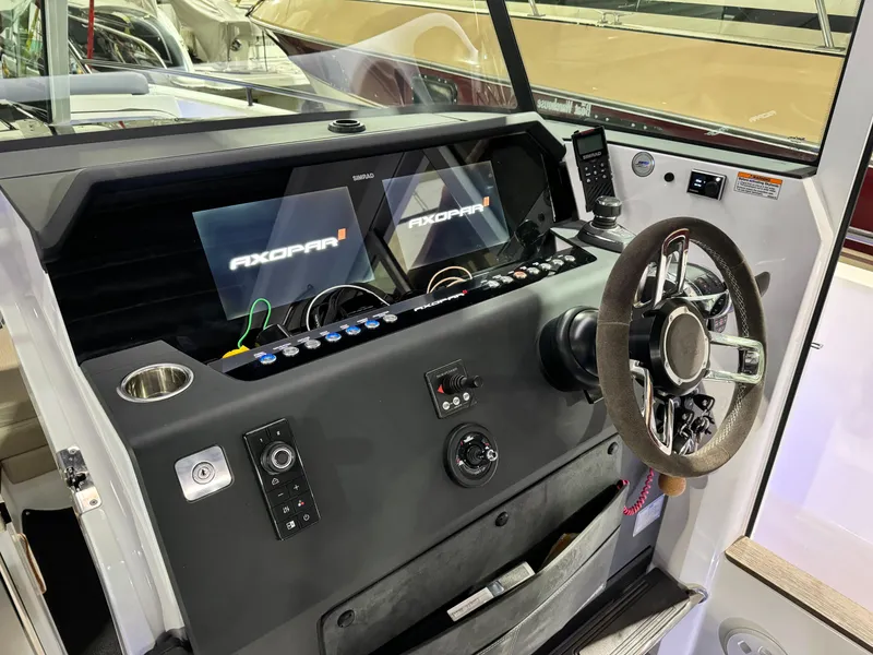 Slide: The Image of Interior of 2020 Axopar 37 Cross Cabin BRABUS with seating and table. - 43