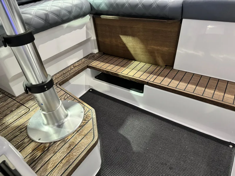 Slide: The Image of Open refrigerator inside 2020 Axopar 37 Cross Cabin BRABUS, showcasing storage compartments. - 47