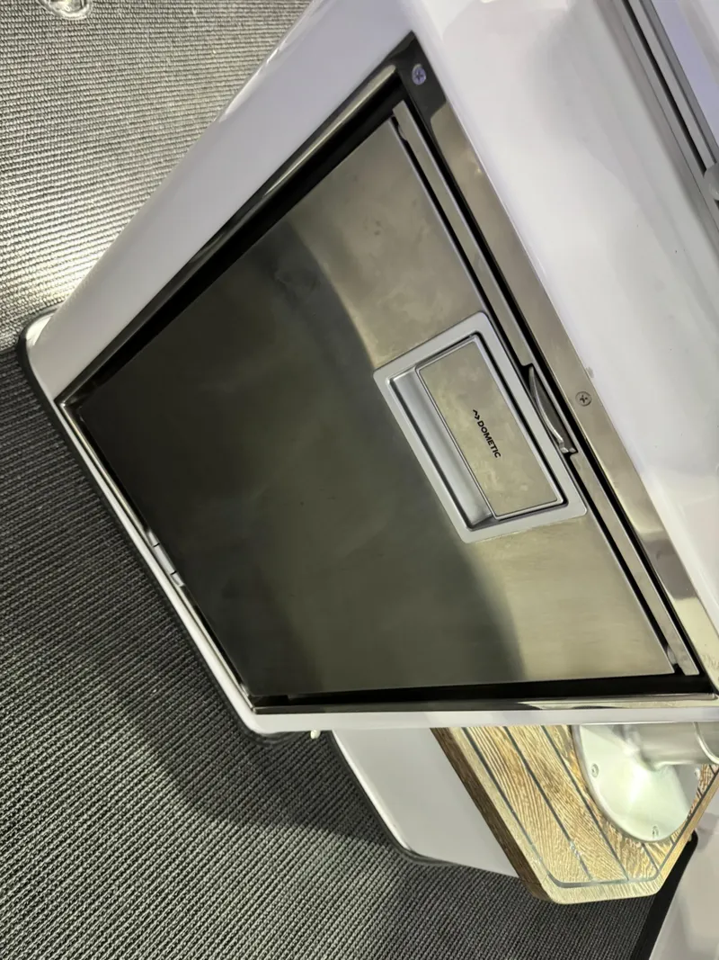 Slide: The Image of Navigation display on Axopar 37 XC, 2020 model, showing coastal map and route details. - 49