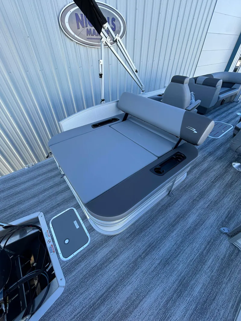 Slide: The Image of 2025 Bennington S 22 pontoon boat with sleek seating and modern design. - 9