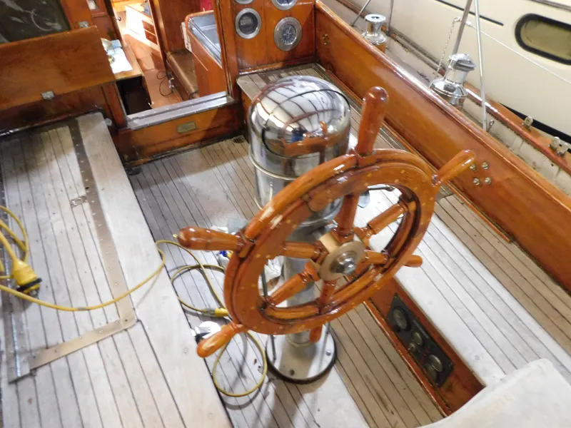 Slide: The Image of Wooden steering wheel on 1949 Burger Full Keel Steel Auxiliary Ketch yacht deck. - 12