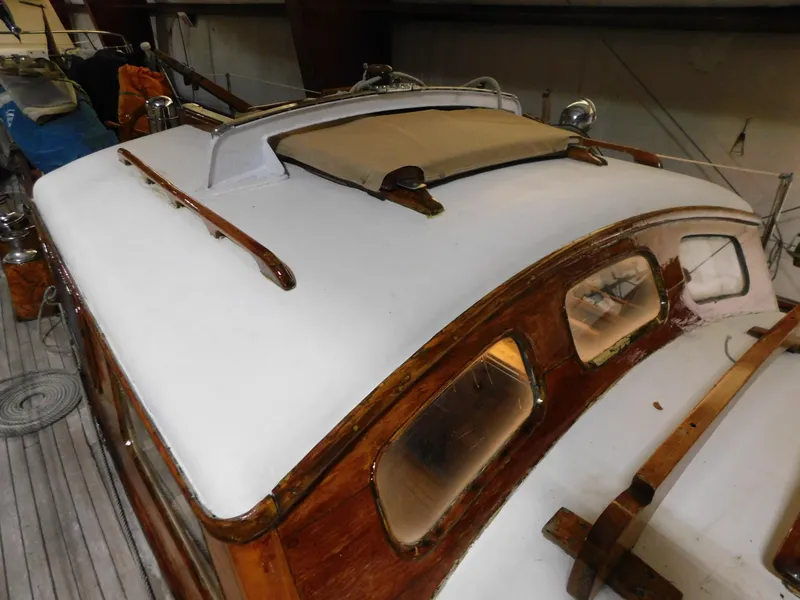 Slide: The Image of 1949 Burger Full Keel Steel Auxiliary Ketch with wooden cabin and white deck. - 17
