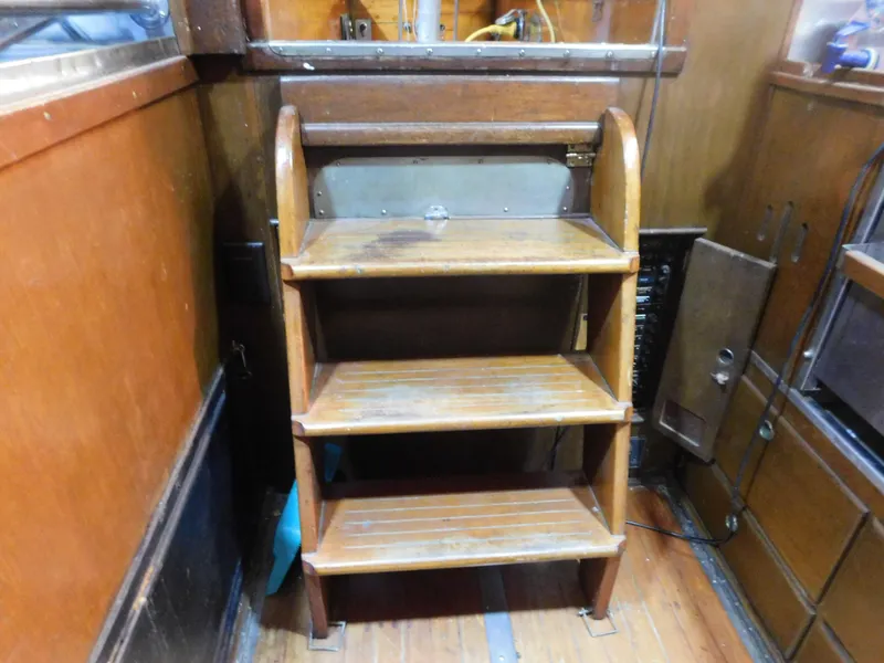 Slide: The Image of Wooden interior stairs on a 1949 Burger Full Keel Steel Auxiliary Ketch. - 25