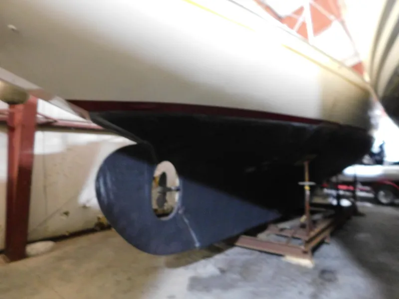 Slide: The Image of 1949 Burger Full Keel Steel Auxiliary Ketch in dry dock, showcasing its keel design. - 3