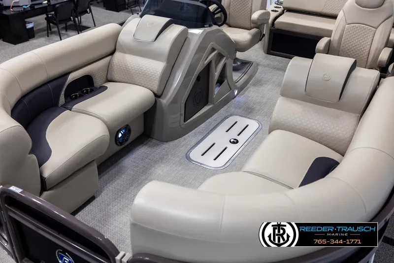 Slide: The Image of 2022 Premier 210 Sunsation pontoon boat interior with plush seating and modern design. - 10