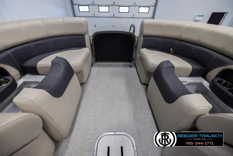 Slide: The Image of 2022 Premier 210 Sunsation boat interior with plush seating and modern design. - 19