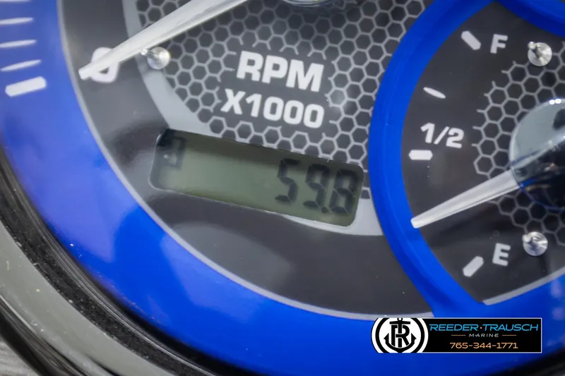 Slide: The Image of Close-up of 2022 Premier 210 Sunsation RPM gauge displaying 598 RPM. - 32
