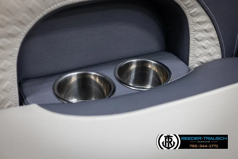 Slide: The Image of 2022 Premier 210 Sunsation boat cup holders, sleek design, luxury interior detail. - 39