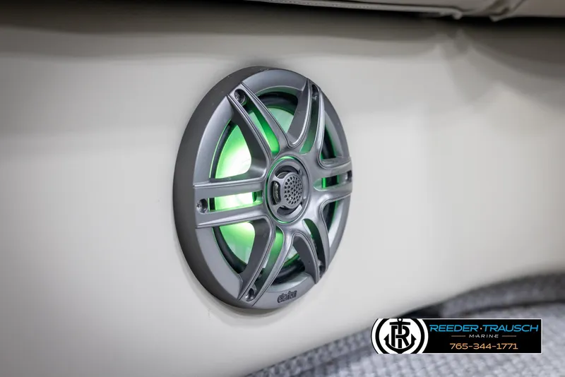 Slide: The Image of Premier 210 Sunsation 2022 boat speaker with green LED lighting. - 42