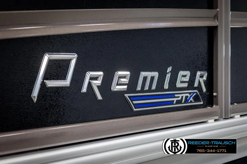 Slide: The Image of 2022 Premier 210 Sunsation PTX logo on boat, Reeder-Trausch Marine branding. - 48