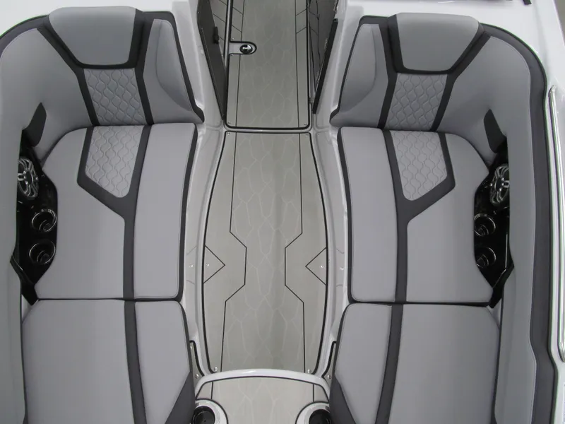 Slide: The Image of 2025 Yamaha Boats 255XD interior with gray seating and modern design. - 8