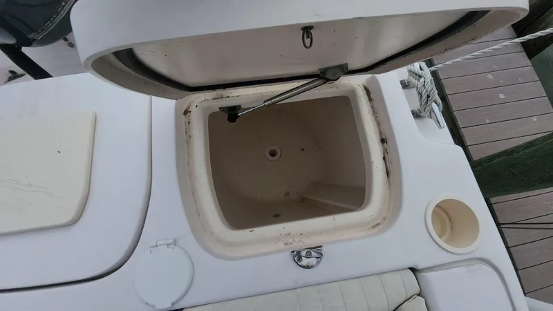 Slide: The Image of Open storage compartment on 2008 Grady-White Advance 257 boat deck. - 10