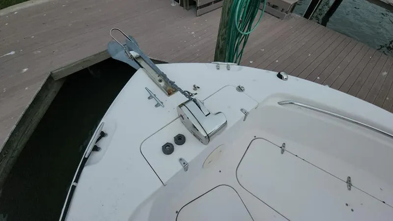 Slide: The Image of 2008 Grady-White Advance 257 boat bow with anchor at dock. - 14