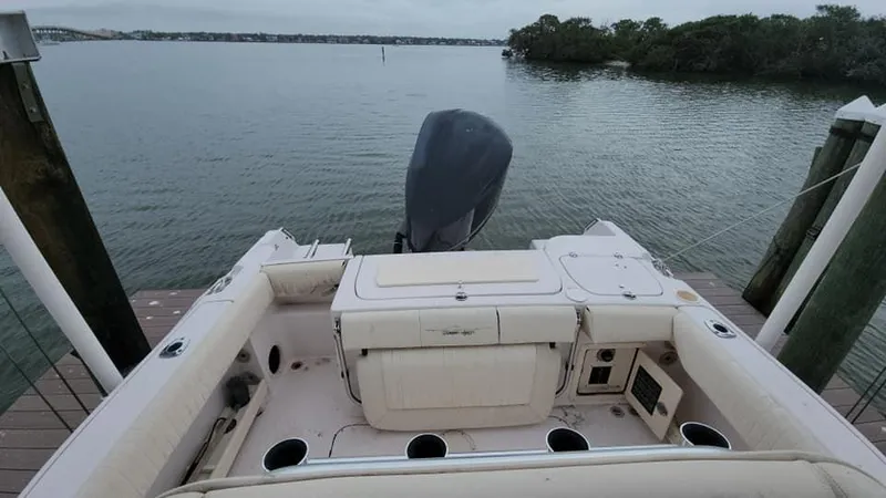Slide: The Image of 2008 Grady-White Advance 257 boat docked by calm waters. - 15