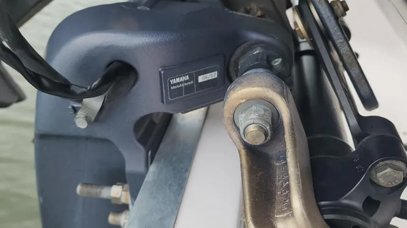 Slide: The Image of Close-up of Yamaha motor part on 2008 Grady-White Advance 257 boat. - 26