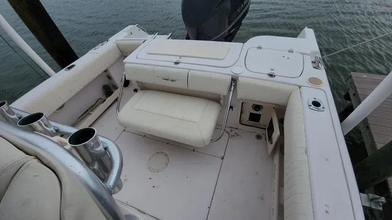 Slide: The Image of 2008 Grady-White Advance 257 boat interior with seating and rod holders. - 3