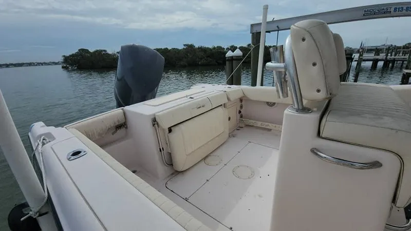 Slide: The Image of 2008 Grady-White Advance 257 boat interior, docked by calm waters. - 32