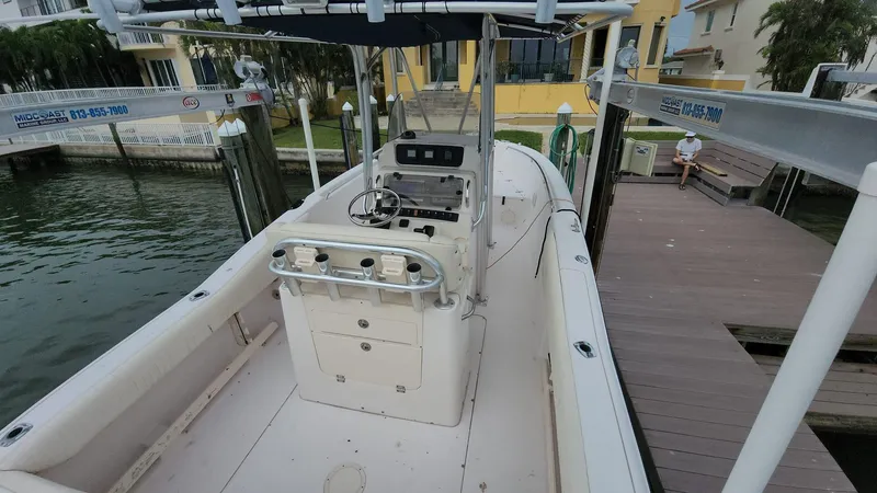 Slide: The Image of 2008 Grady-White Advance 257 boat docked near waterfront homes. - 33