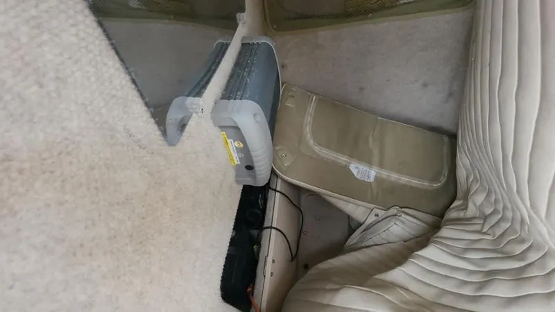 Slide: The Image of Interior of 2008 Grady-White Advance 257 boat with beige upholstery. - 35