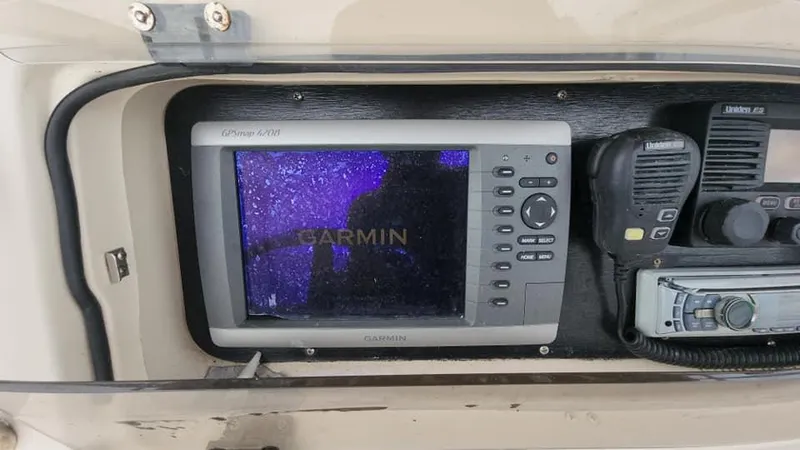 Slide: The Image of Garmin GPS and radio equipment on 2008 Grady-White Advance 257 boat. - 38
