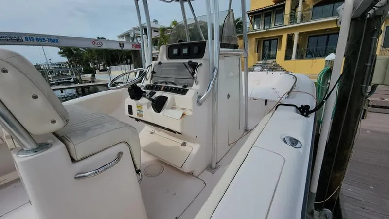 Slide: The Image of 2008 Grady-White Advance 257 boat interior with helm and seating. - 40