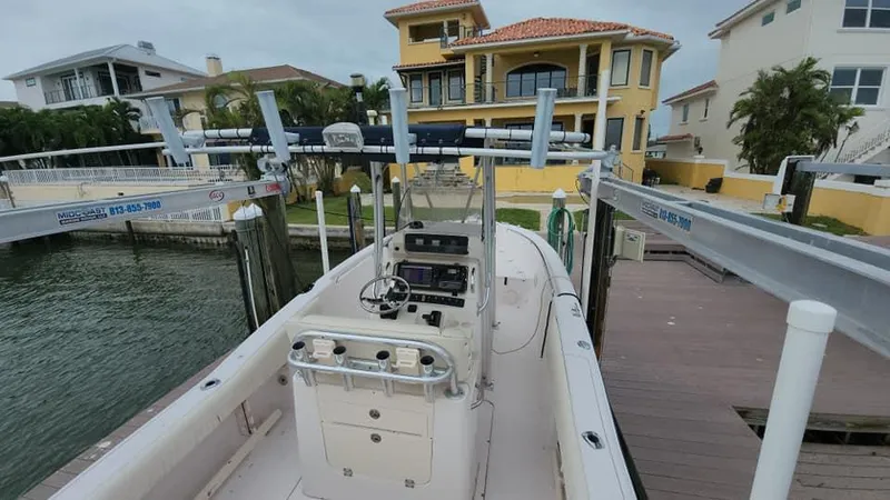 Slide: The Image of 2008 Grady-White Advance 257 boat docked near waterfront homes. - 42