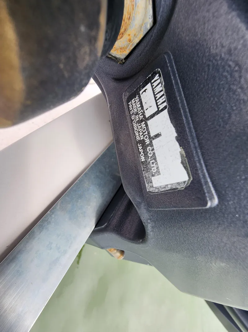Slide: The Image of Close-up of a Yamaha motor label on a 2008 Grady-White Advance 257 boat. - 8
