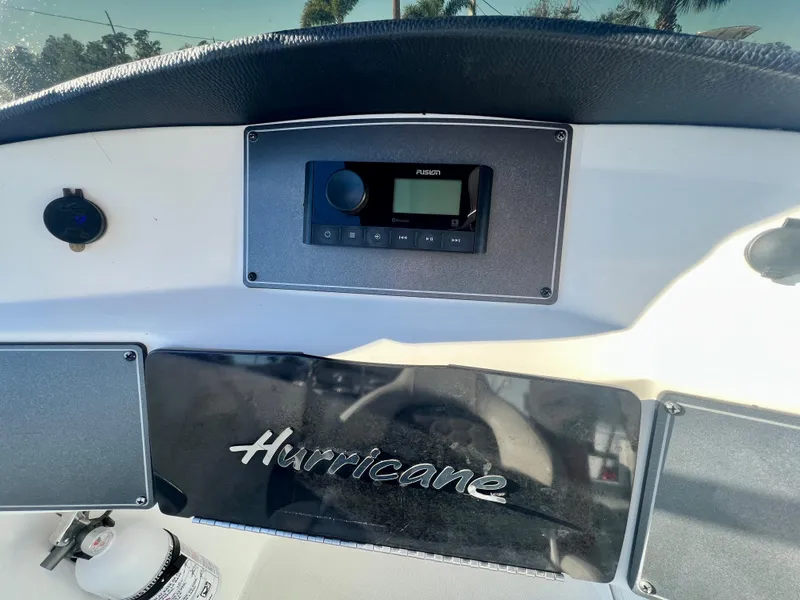 Slide: The Image of Dashboard of 2023 Hurricane 218 SS boat with Fusion stereo system. - 13