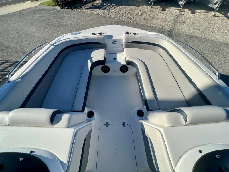 Slide: The Image of 2023 Hurricane 218 SS boat interior with spacious seating and cup holders. - 14