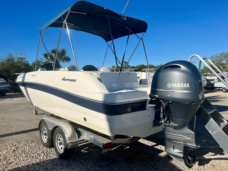 Slide: The Image of 2023 Hurricane 218 SS boat with Yamaha outboard motor on trailer. - 5