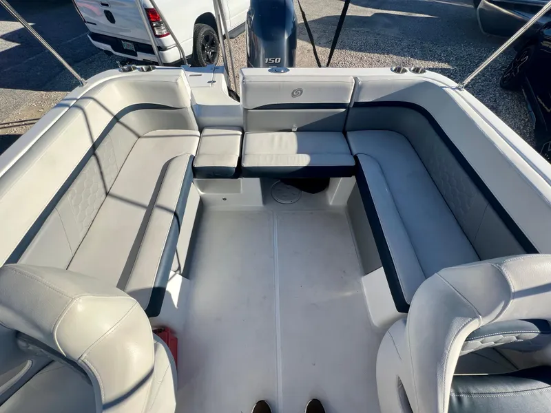 Slide: The Image of 2023 Hurricane 218 SS boat interior with spacious seating and modern design. - 9