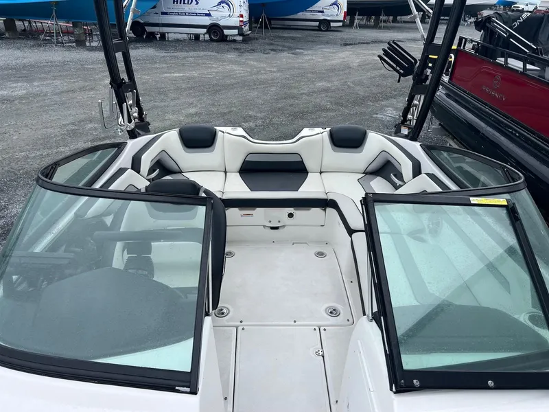 Slide: The Image of 2017 Yamaha AR195 boat interior with seating and open windshield. - 5