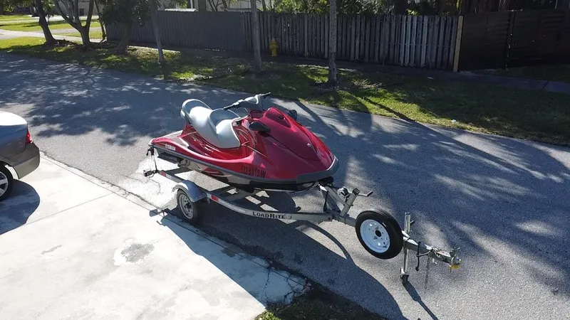 Slide: The Image of Red 2014 Yamaha WaveRunner VX Cruiser on trailer in driveway. - 4