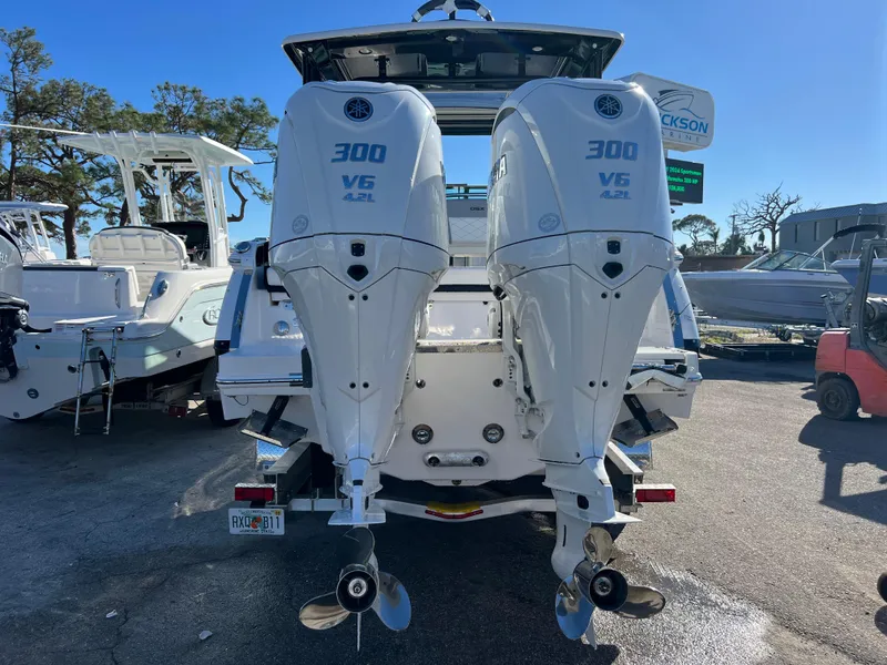Slide: The Image of 2025 Chaparral 310 OSX boat with twin 300 V6 outboard engines. - 3