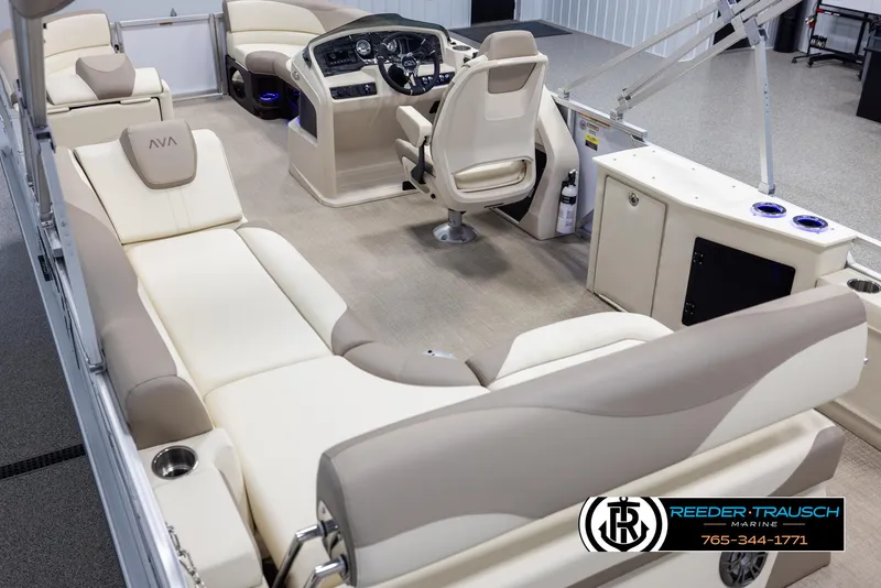 Slide: The Image of Luxurious interior of 2025 Avalon LSZ CRB pontoon boat with plush seating and modern dashboard. - 11