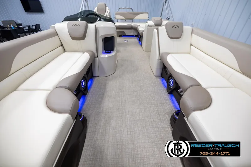 Slide: The Image of Luxurious interior of 2025 Avalon LSZ CRB pontoon boat with LED lighting and plush seating. - 13