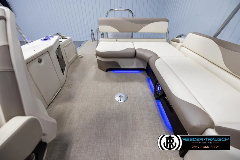 Slide: The Image of Luxurious interior of 2025 Avalon LSZ CRB pontoon boat with LED lighting and plush seating. - 15