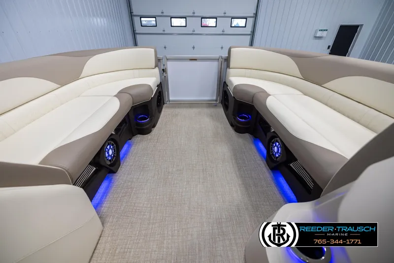 Slide: The Image of Luxurious interior of 2025 Avalon LSZ CRB pontoon boat with LED lighting and plush seating. - 18