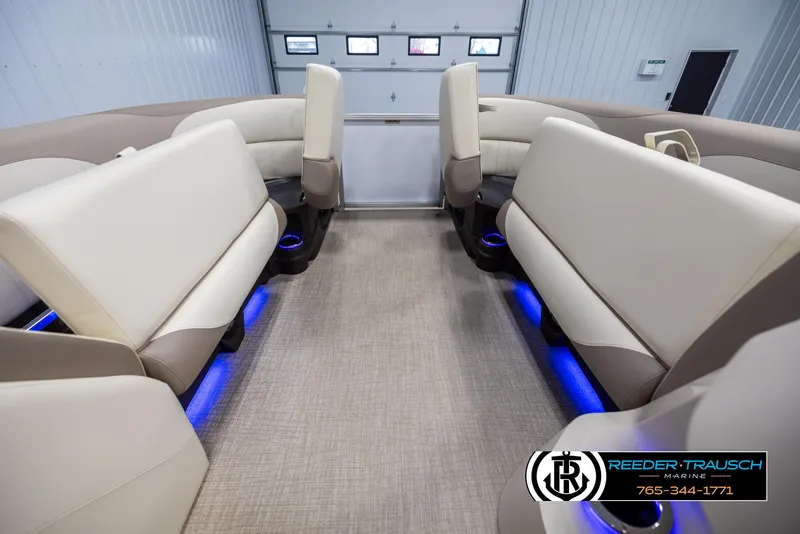 Slide: The Image of Luxurious interior of 2025 Avalon LSZ CRB pontoon boat with blue LED lighting. - 19