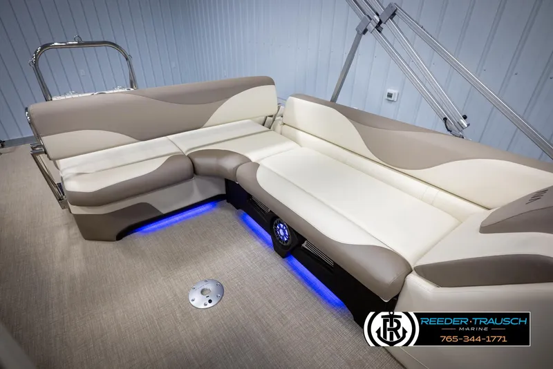 Slide: The Image of Luxurious seating on 2025 Avalon LSZ CRB boat with ambient blue lighting. - 27
