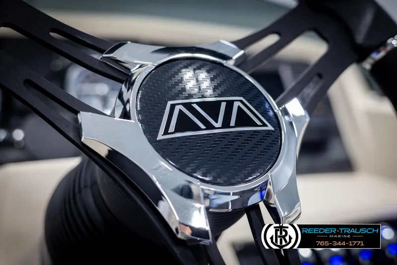Slide: The Image of Steering wheel of 2025 Avalon LSZ CRB boat with chrome accents and logo. - 32