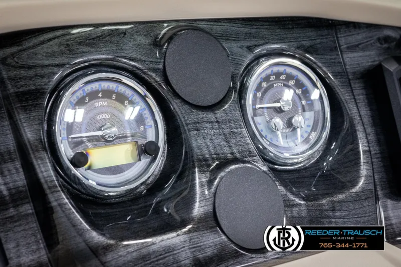 Slide: The Image of Dashboard of 2025 Avalon LSZ CRB with RPM and MPH gauges, Reeder-Trausch Marine branding. - 35