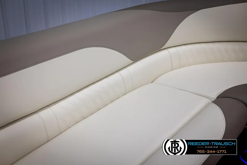 Slide: The Image of Luxurious seating in 2025 Avalon LSZ CRB boat, featuring elegant beige and brown upholstery. - 39