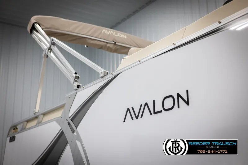 Slide: The Image of 2025 Avalon LSZ CRB boat with canopy, showcased at Reeder-Trausch Marine. - 49
