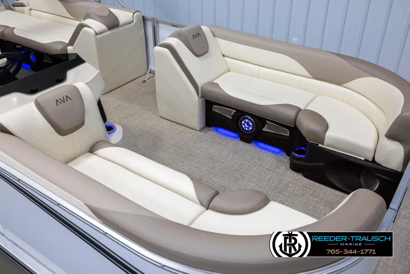Slide: The Image of Luxurious 2025 Avalon LSZ CRB boat interior with plush seating and ambient blue lighting. - 9