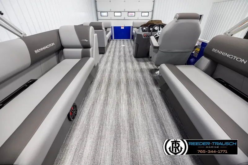 Slide: The Image of 2025 Bennington 21 SSRSE pontoon boat interior with gray seating and modern design. - 15