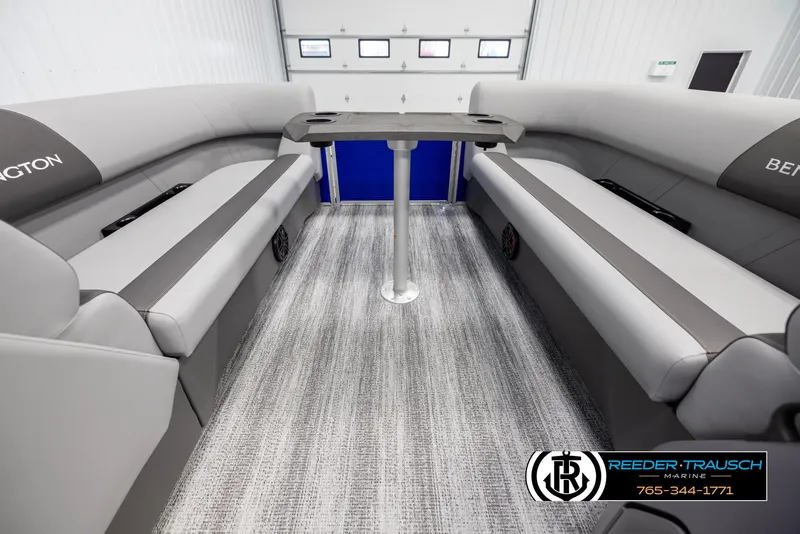 Slide: The Image of 2025 Bennington 21 SSRSE boat interior with gray seating and table. - 19