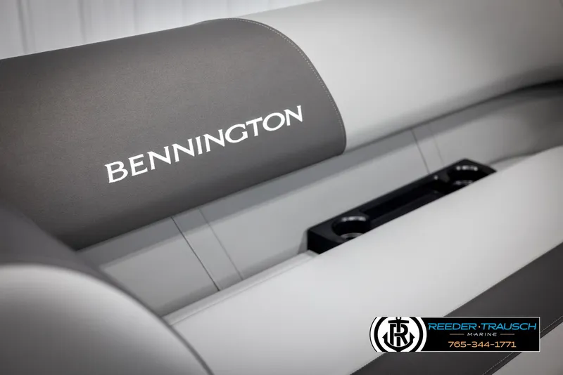 Slide: The Image of 2025 Bennington 21 SSRSE boat seat with logo and cup holders. - 31