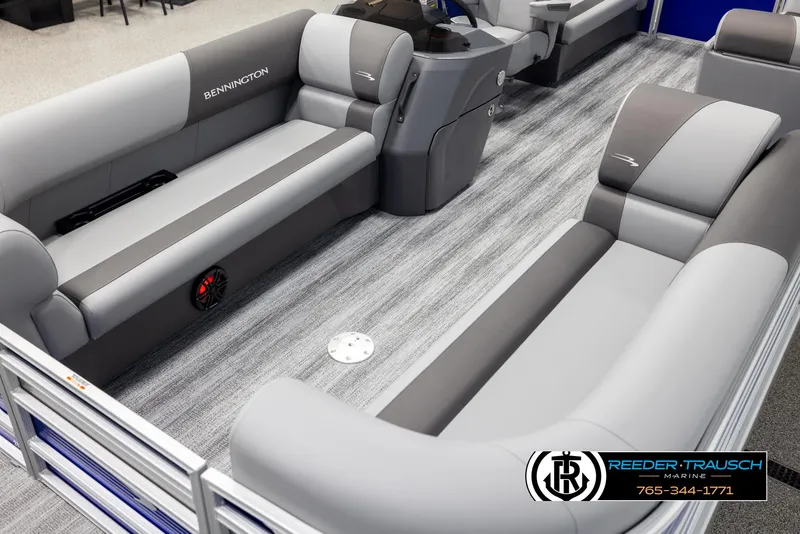 Slide: The Image of 2025 Bennington 21 SSRSE pontoon boat interior with gray seating and modern design. - 9