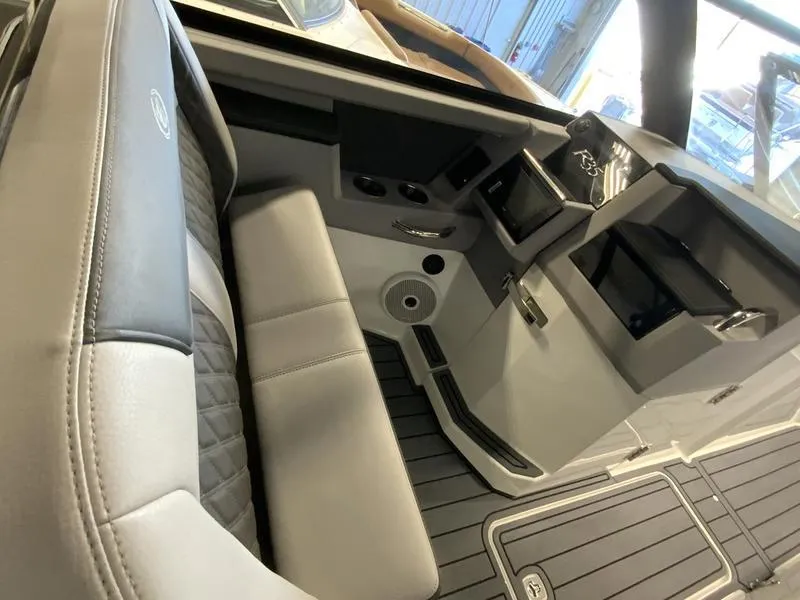 Slide: The Image of Interior of 2025 Cobalt R35 boat with luxurious seating and modern dashboard. - 10